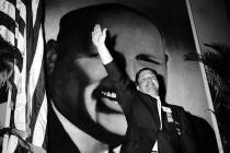 In this Sept. 30, 1957 file photo, Jimmy Hoffa, Teamsters vice president, waves to delegates at ...
