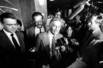 U.S. District Judge Harry Claiborne talks to reporters after the jury in his political corrupti ...