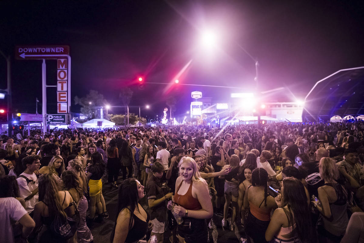 Festival goers pack the intersection of South 8th Street and Fremont Street during the first da ...