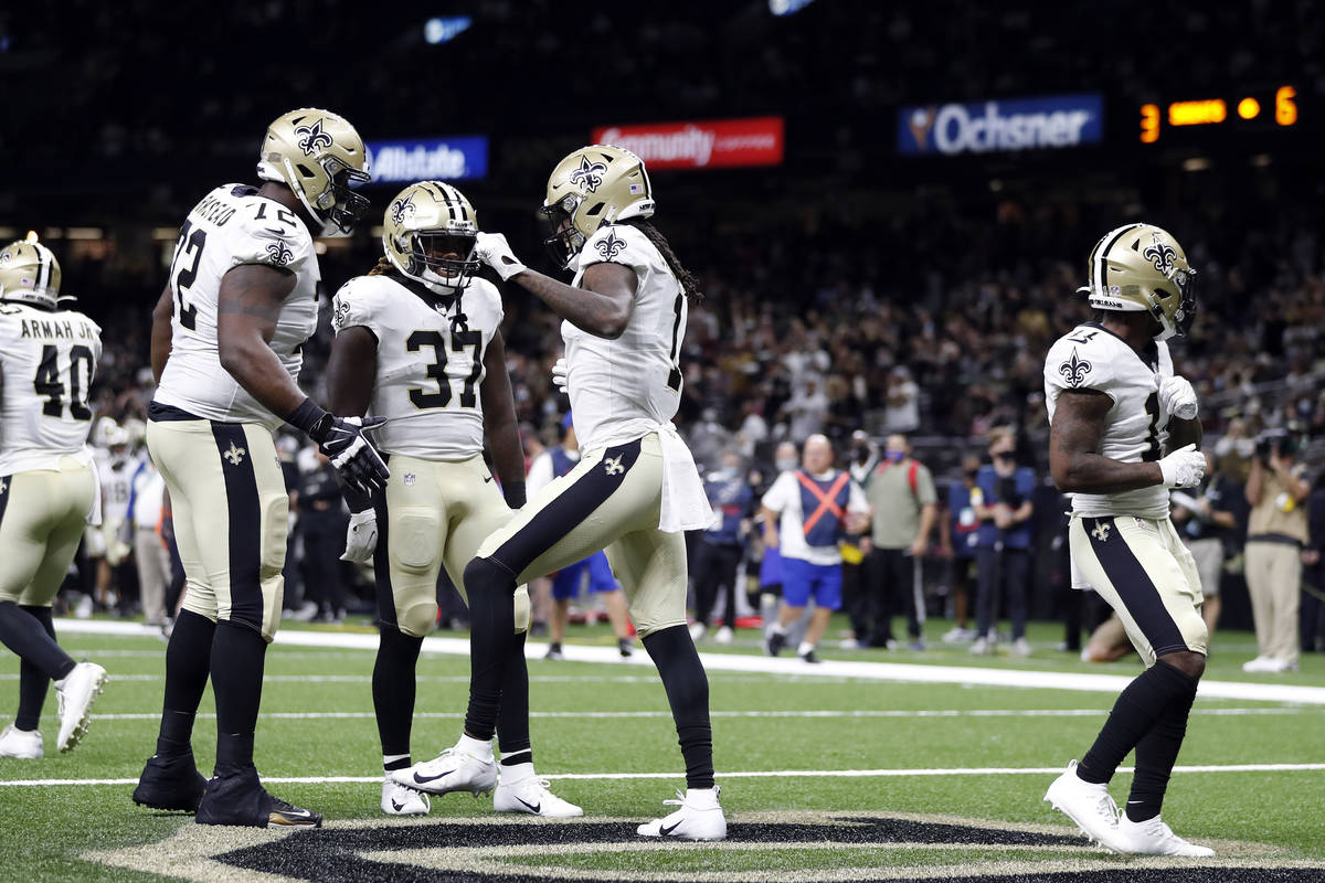 New Orleans Saints wide receiver Marquez Callaway (1), offensive tackle Terron Armstead (72) an ...