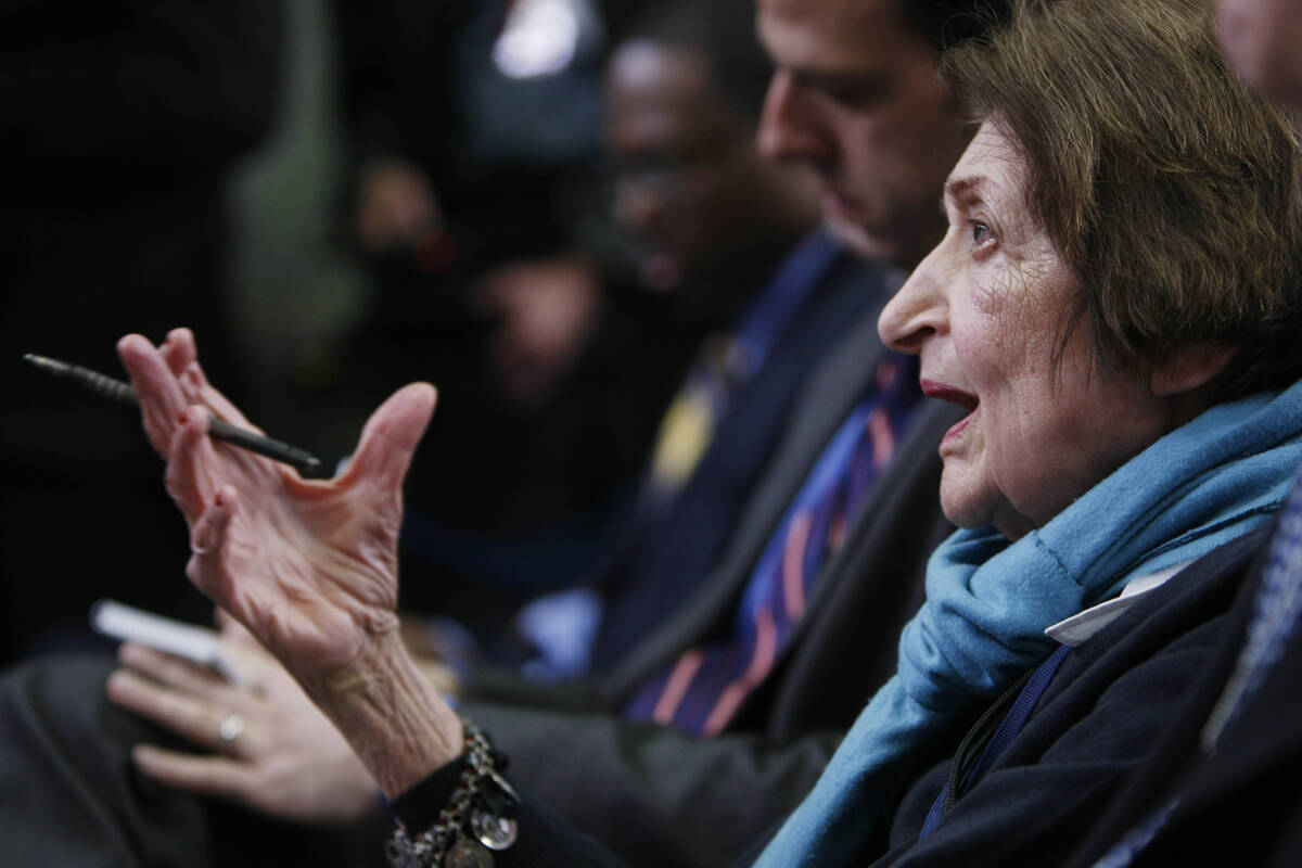 In this March 26, 2009, file photo, veteran White House reporter Helen Thomas asks White House ...