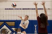 Sierra Vista’s Maysen Bruschke (4) serves during a girls high school volleyball game aga ...
