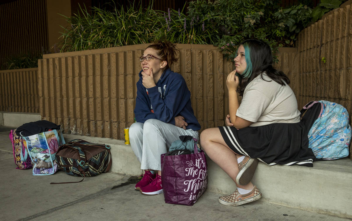 Jillian Kohlstrom, left, and daughter Anastasia Ringgard, 13, await a ride from the MontBleu no ...
