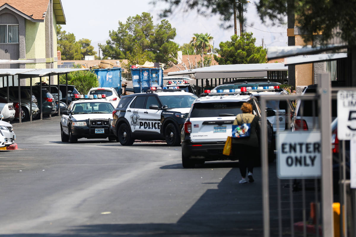 Police at the apartment complex where a shooting took place in the 1900 block of North Jones Bo ...