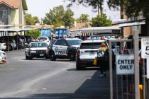 Police at the apartment complex where a shooting took place in the 1900 block of North Jones Bo ...