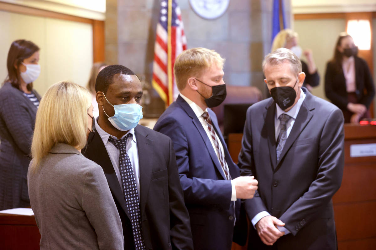 Antonio Bridges, second from left, who is charged in the death of his girlfriend's 1-year-old s ...