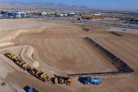 A giant hole in the ground at 8030 W Maule Ave., is shown in the southwest Las Vegas Valley whe ...