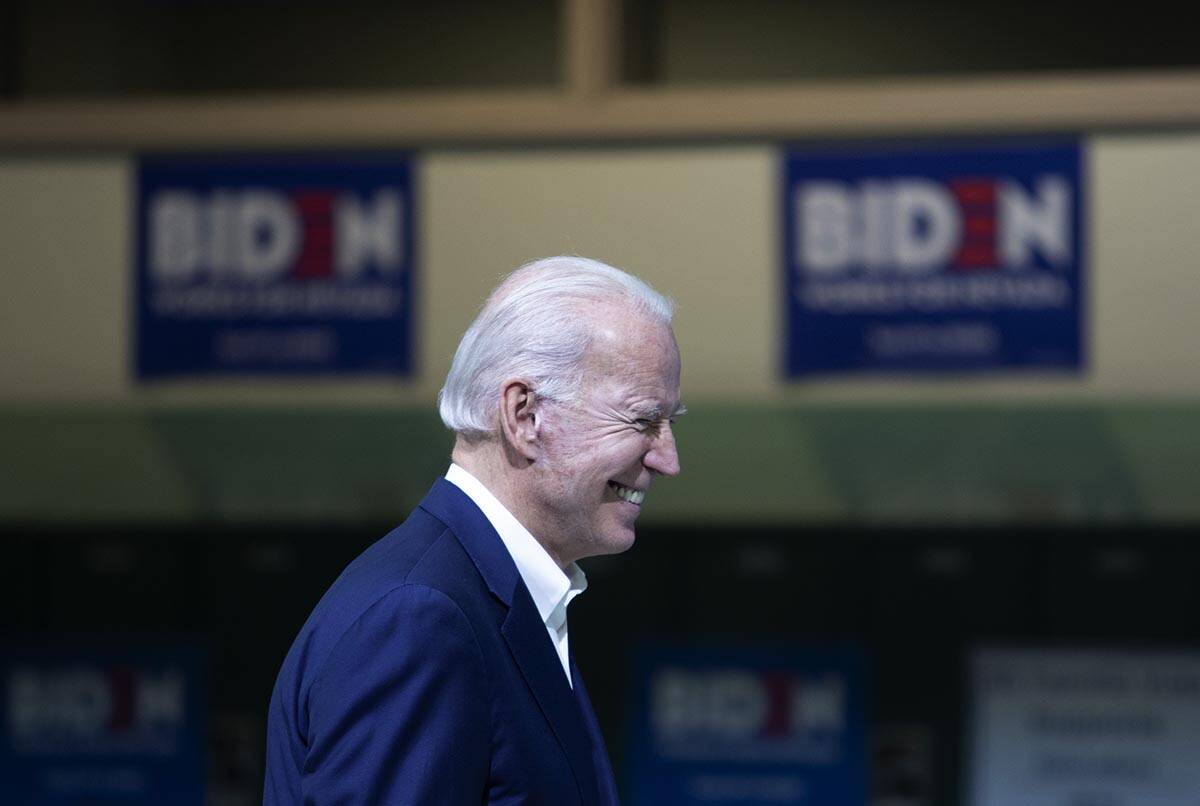 Joe Biden laughs at a joke he made during a campaign event at Rancho High School on Saturday, J ...