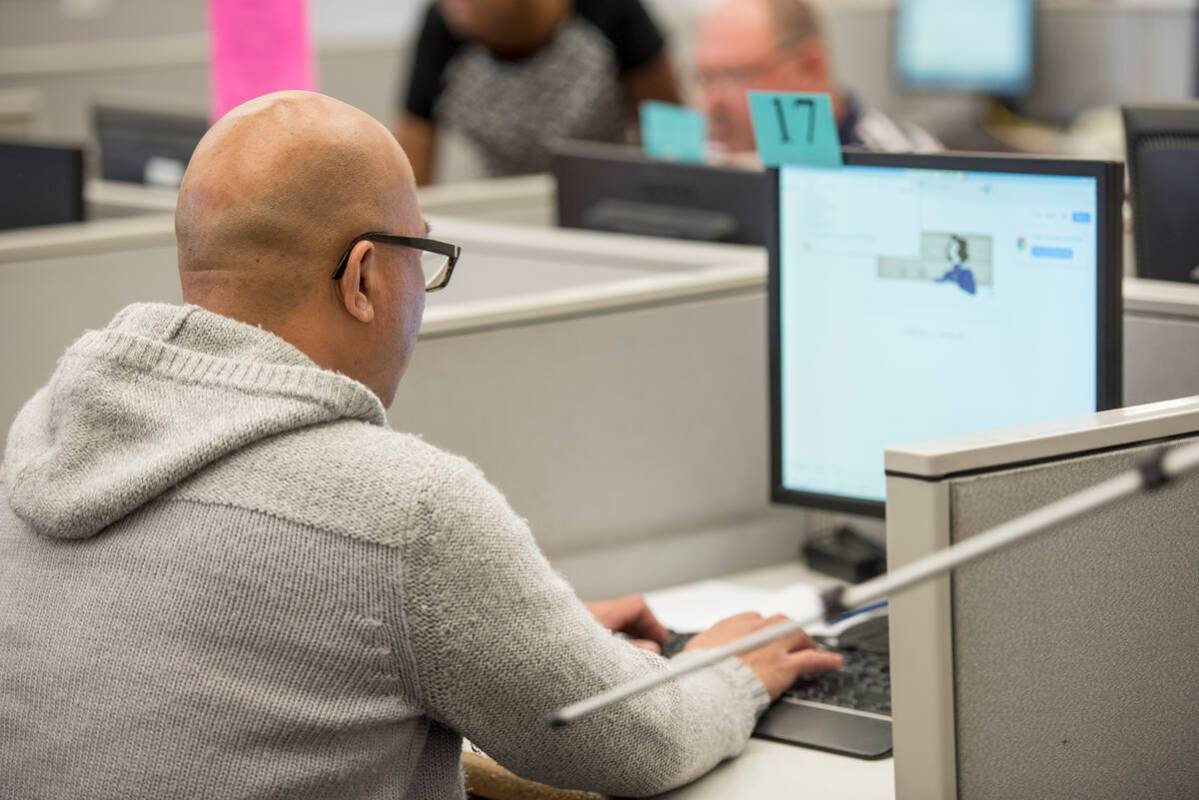 Shaun Lertswan, 40, searches for jobs on a computer at the Nevada JobConnect Center in Las Vega ...