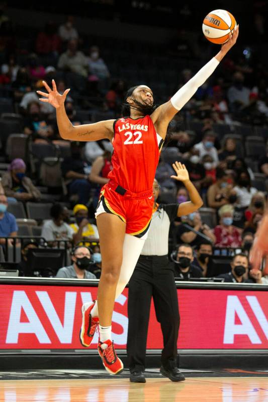 Las Vegas Aces forward A'ja Wilson (22) regains control of the ball during the first half of a ...