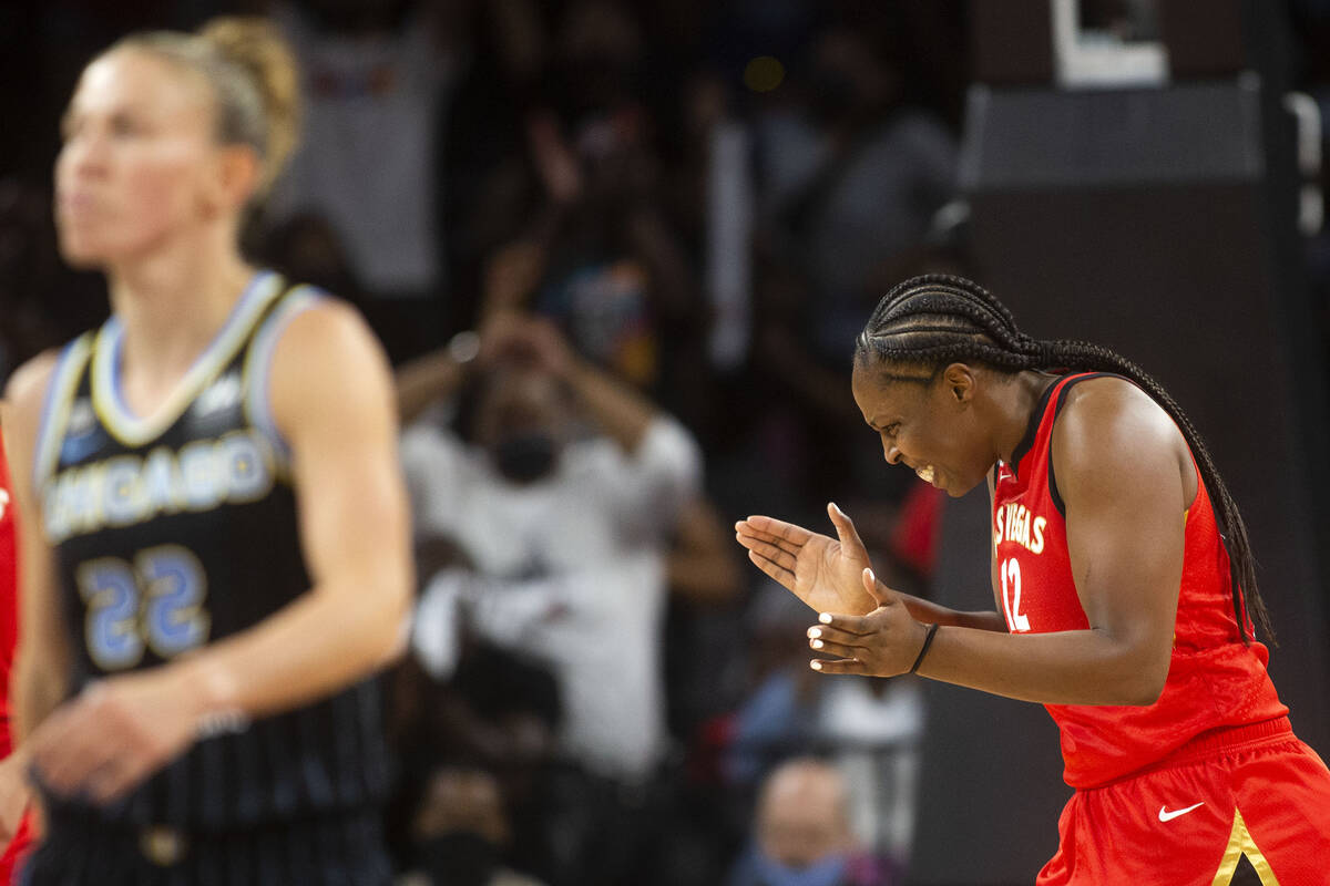 Chicago Sky guard Courtney Vandersloot (22) walks off as Las Vegas Aces guard Chelsea Gray (12) ...