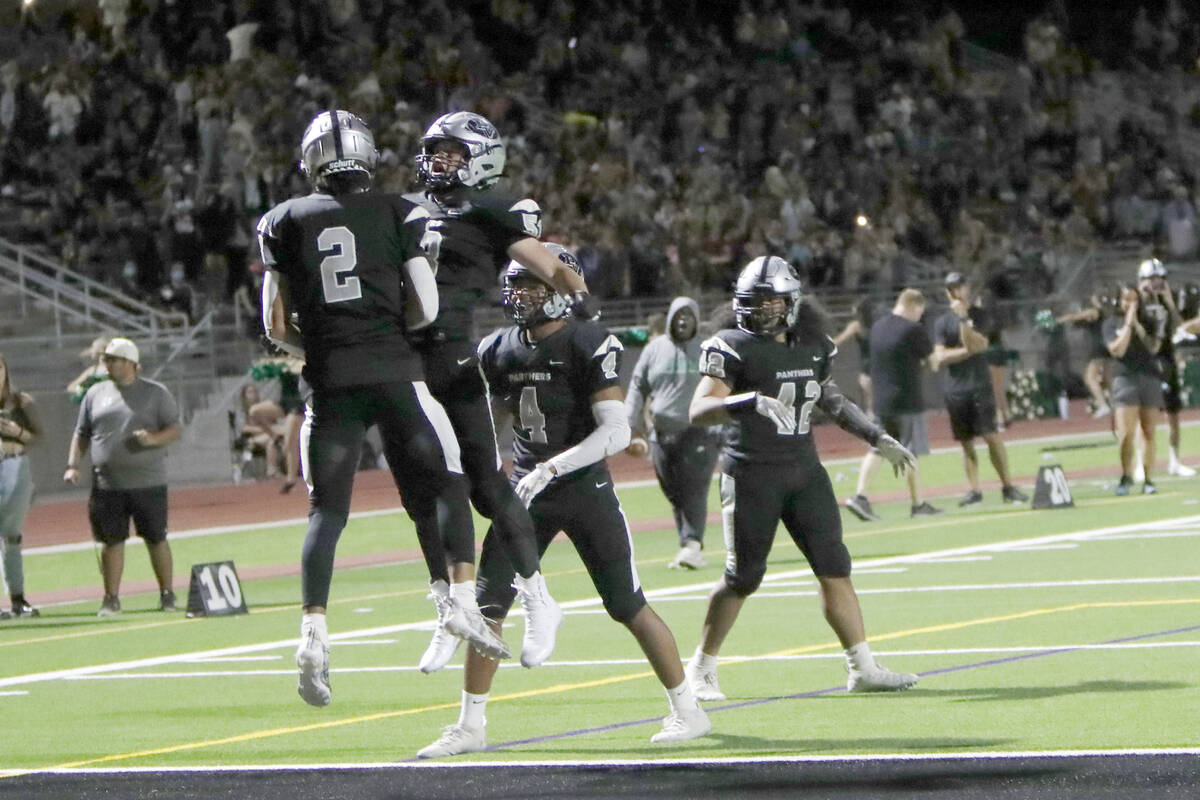 Palo Verde High School's Paisley Nickelson (2) celebrates his touchdown with his teammates Dust ...