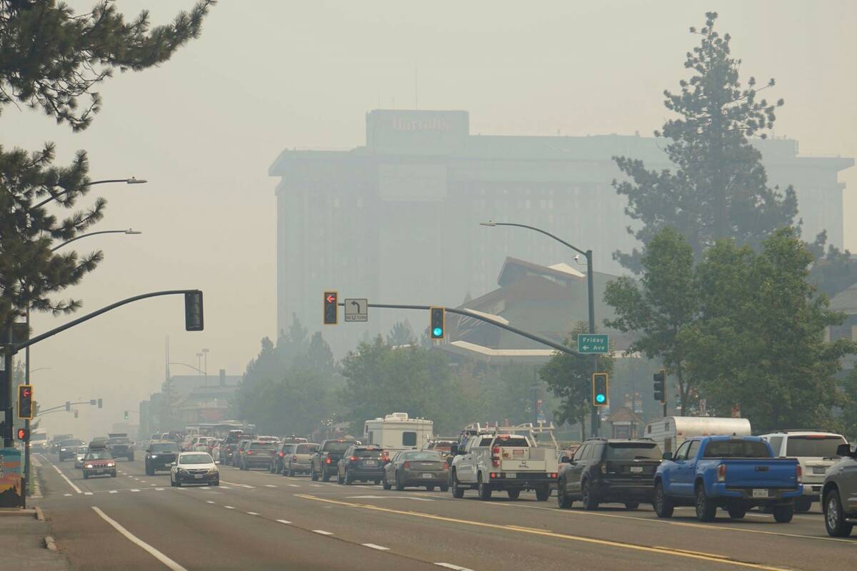 Vehicles idle in bumper-to-bumper traffic after a wildfire evacuation order in South Lake Tahoe ...