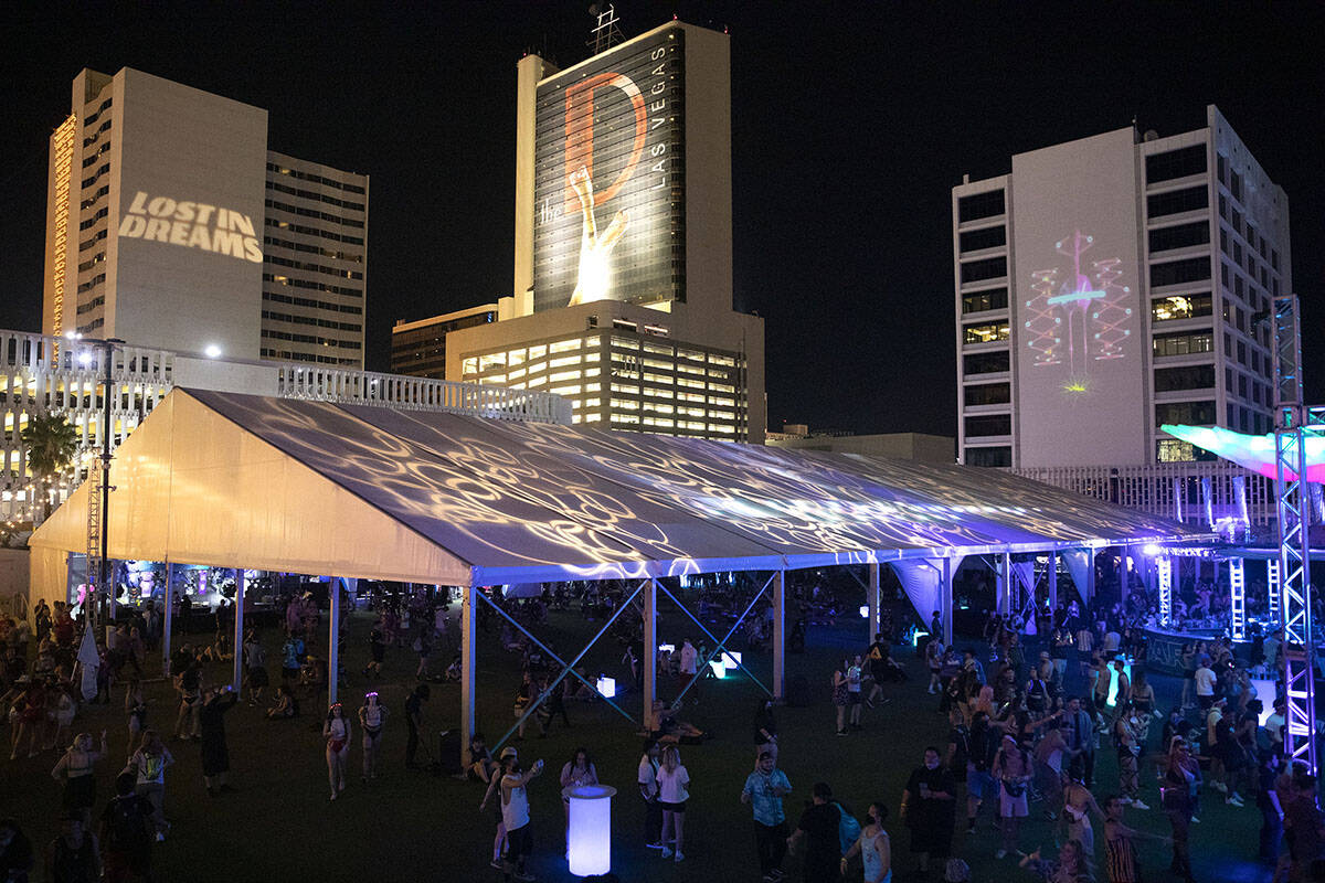 Projections adorn downtown buildings during the Lost in Dreams music festival at the Downtown L ...