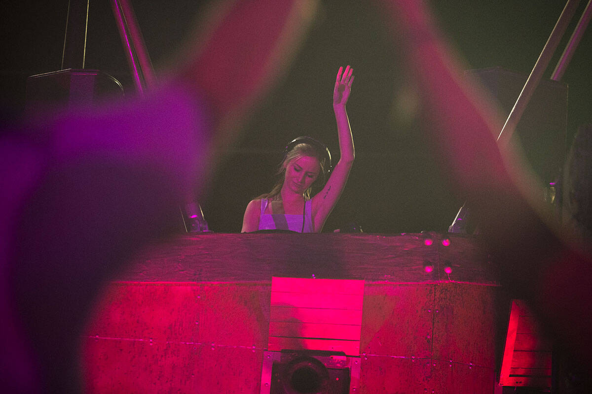 DJ Pauline Herr dances during her set at the Lost in Dreams music festival at the Downtown Las ...