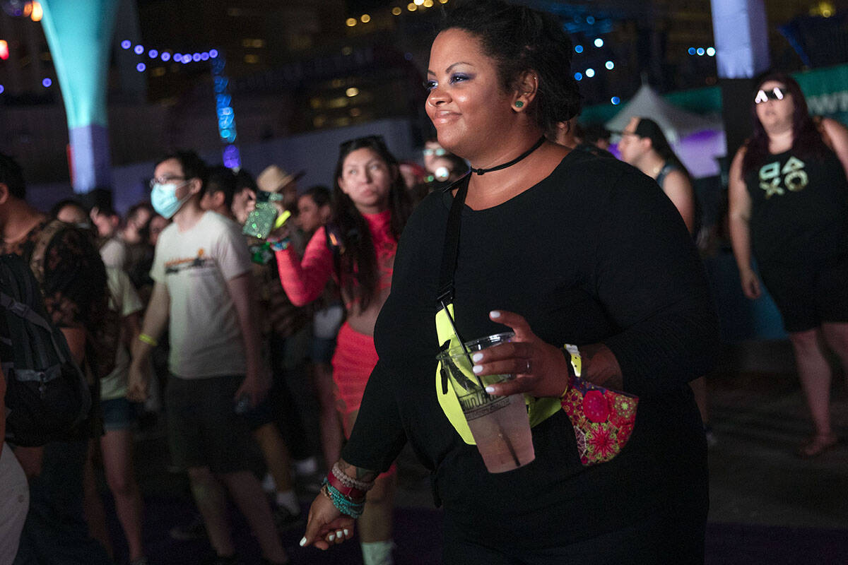 Noura Khoury sways to Devault's set during the Lost in Dreams music festival at the Downtown La ...
