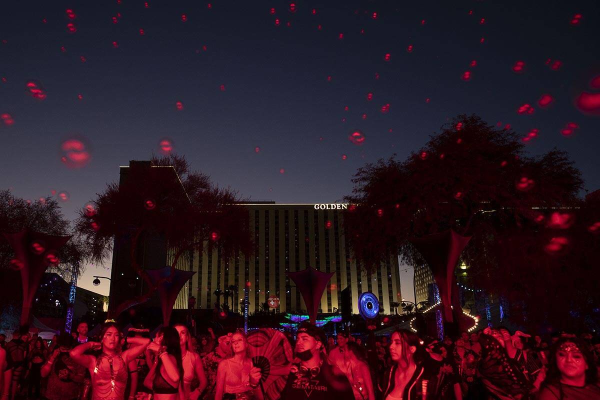 Bubbles fill the air as fans dance to Pluko's set during the Lost in Dreams music festival at t ...