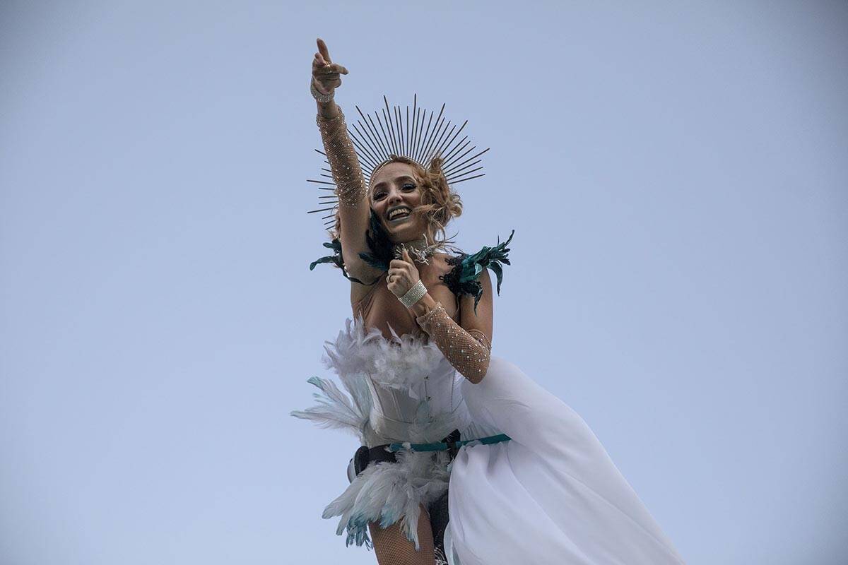 A performer with Sway Poles entertains attendees of the Lost in Dreams music festival at the Do ...