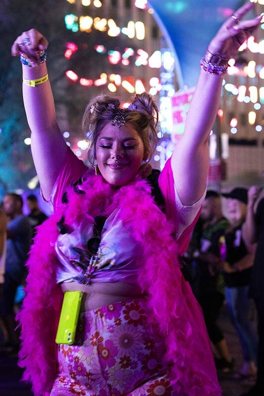 Taia Lemay, of Las Vegas, dances to Pluko's set during the Lost in Dreams music festival at the ...