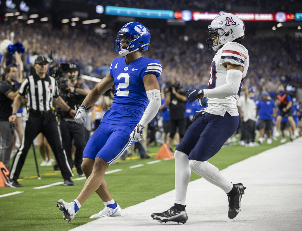 Brigham Young Cougars wide receiver Neil Pau'u (2) celebrates in front of Arizona Wildcats corn ...