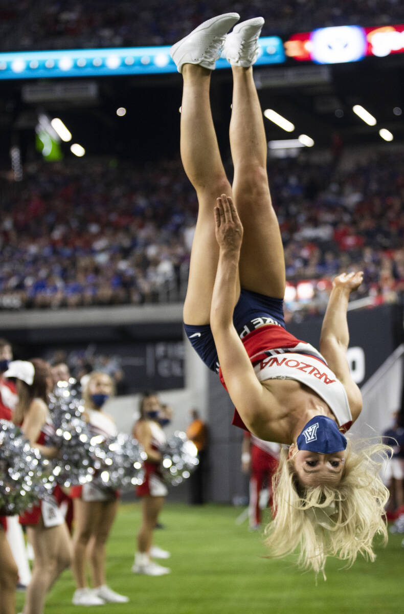 Arizona Wildcat cheerleaders perform in the second quarter during a college football game again ...