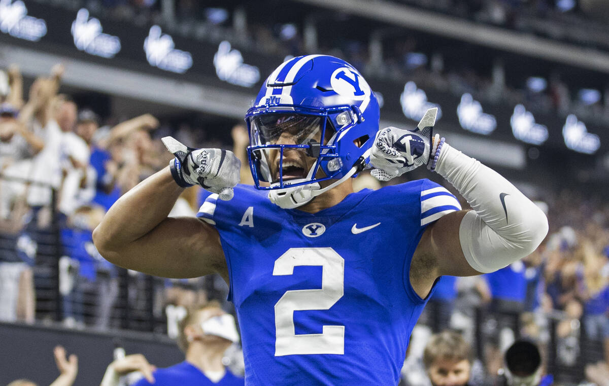 Brigham Young Cougars wide receiver Neil Pau'u (2) celebrates after scoring in the second quart ...