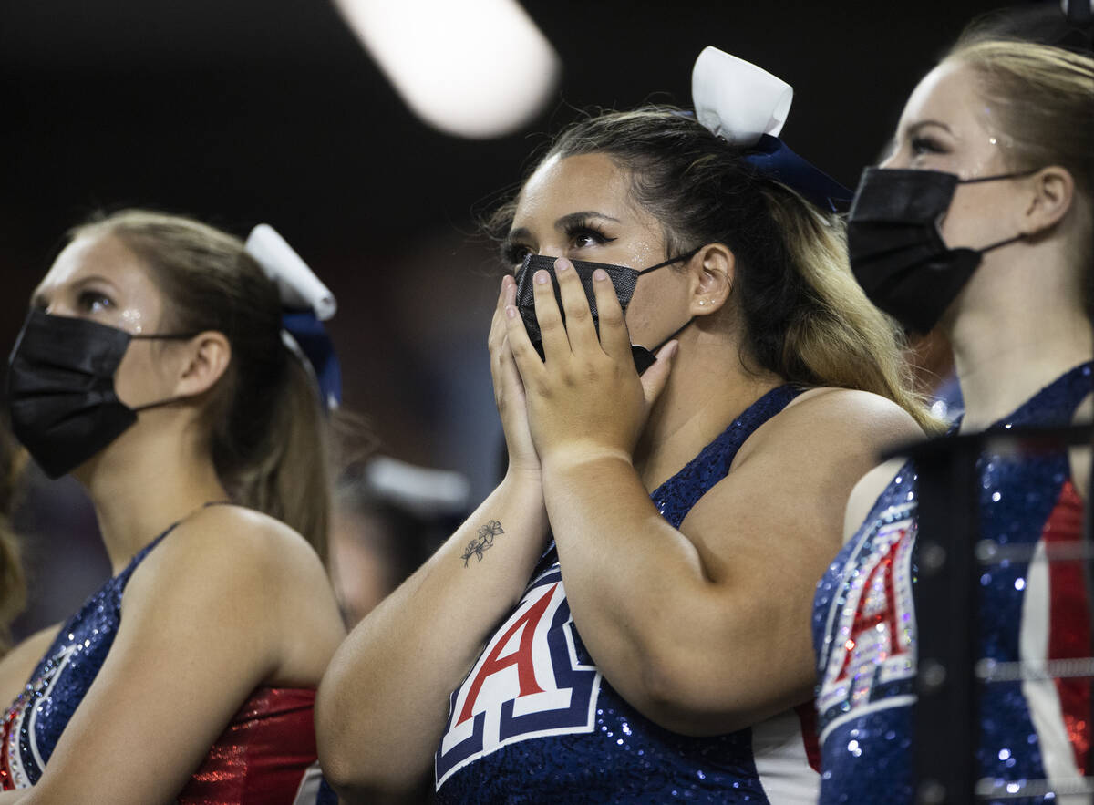 University of Arizona students watch their team take on BYU in the fourth quarter during a coll ...