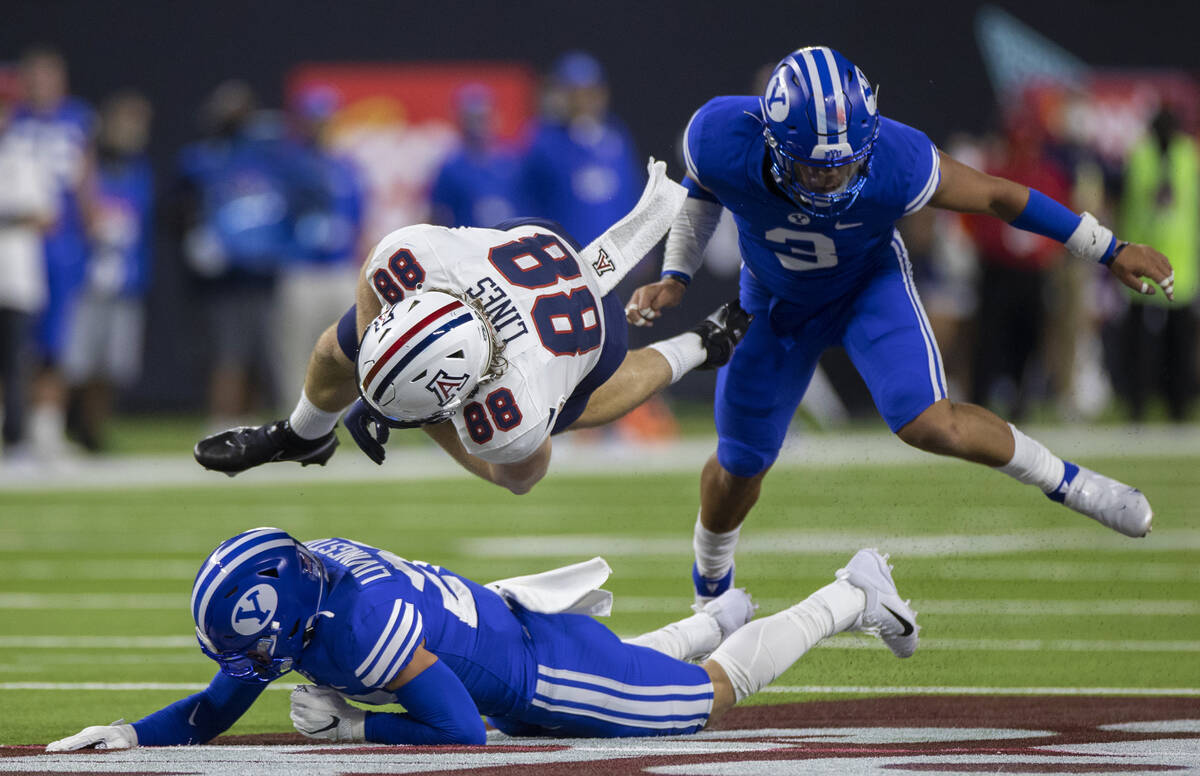 Arizona Wildcats tight end Alex Lines (88) collides with Brigham Young Cougars defensive back H ...