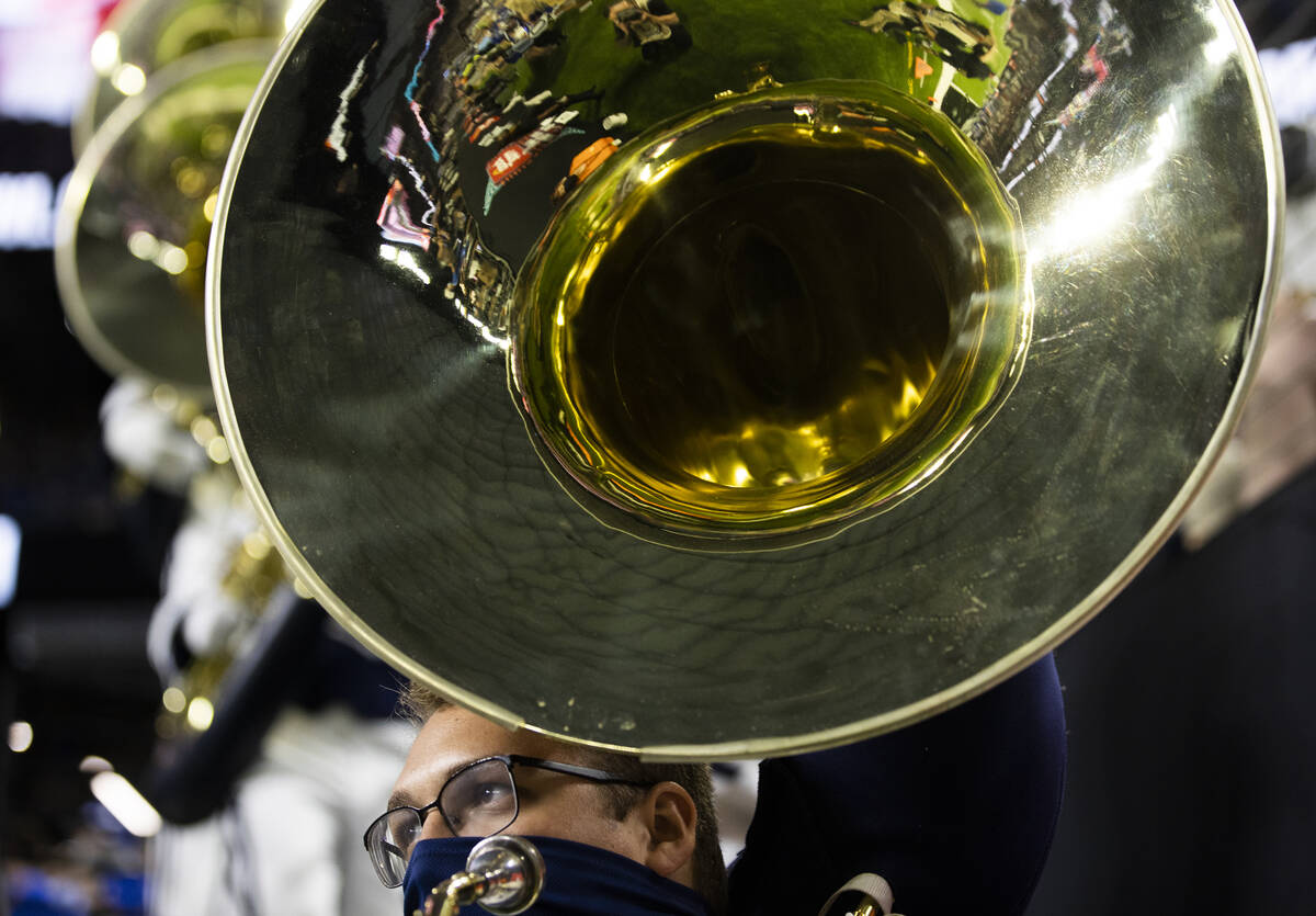 The BYU marching band performs in the first quarter during a college football game against the ...