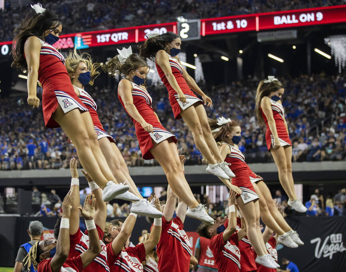 Arizona Wildcat cheerleaders perform in the first quarter during a college football game agains ...