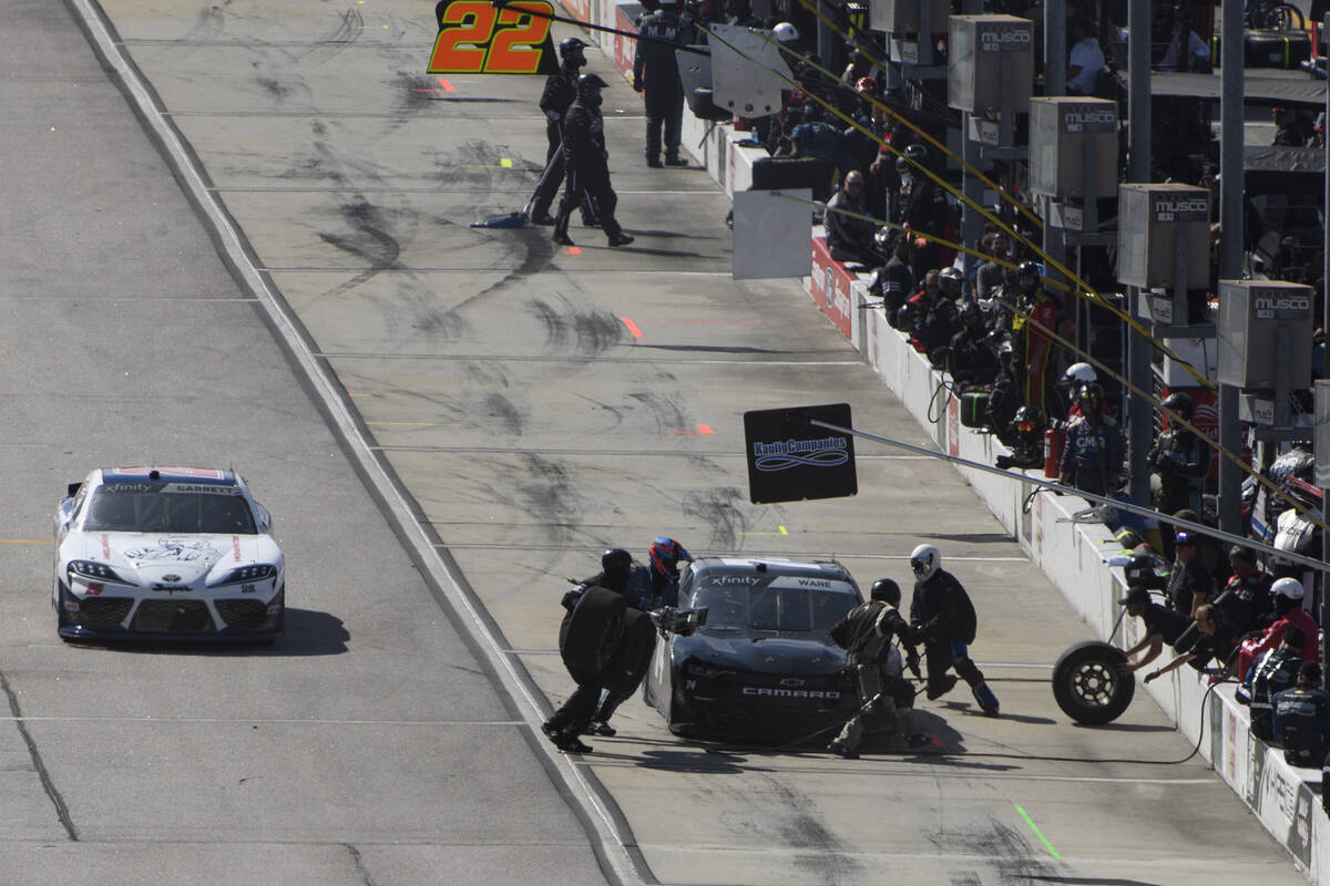 Carson Ware makes a pit stop after causing a yellow flag during a NASCAR Xfinity Series auto ra ...