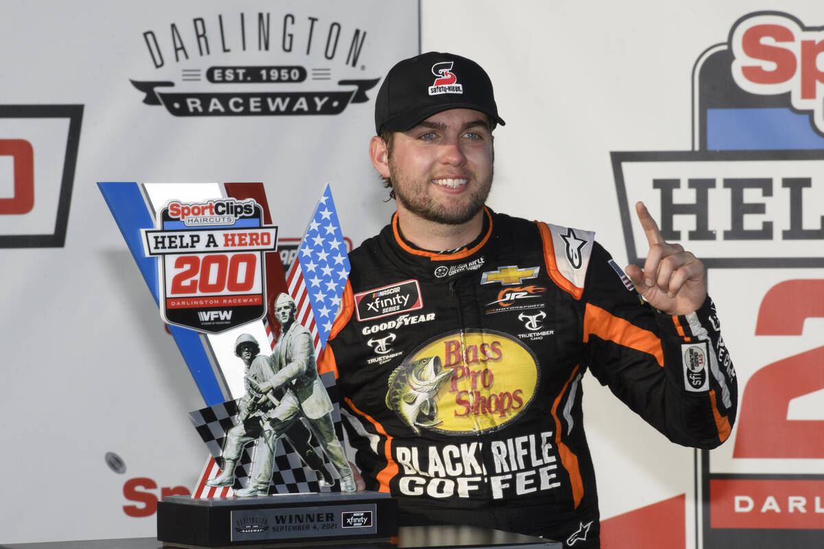 Noah Gragson stands with the trophy after winning a NASCAR Xfinity Series auto race Saturday, S ...