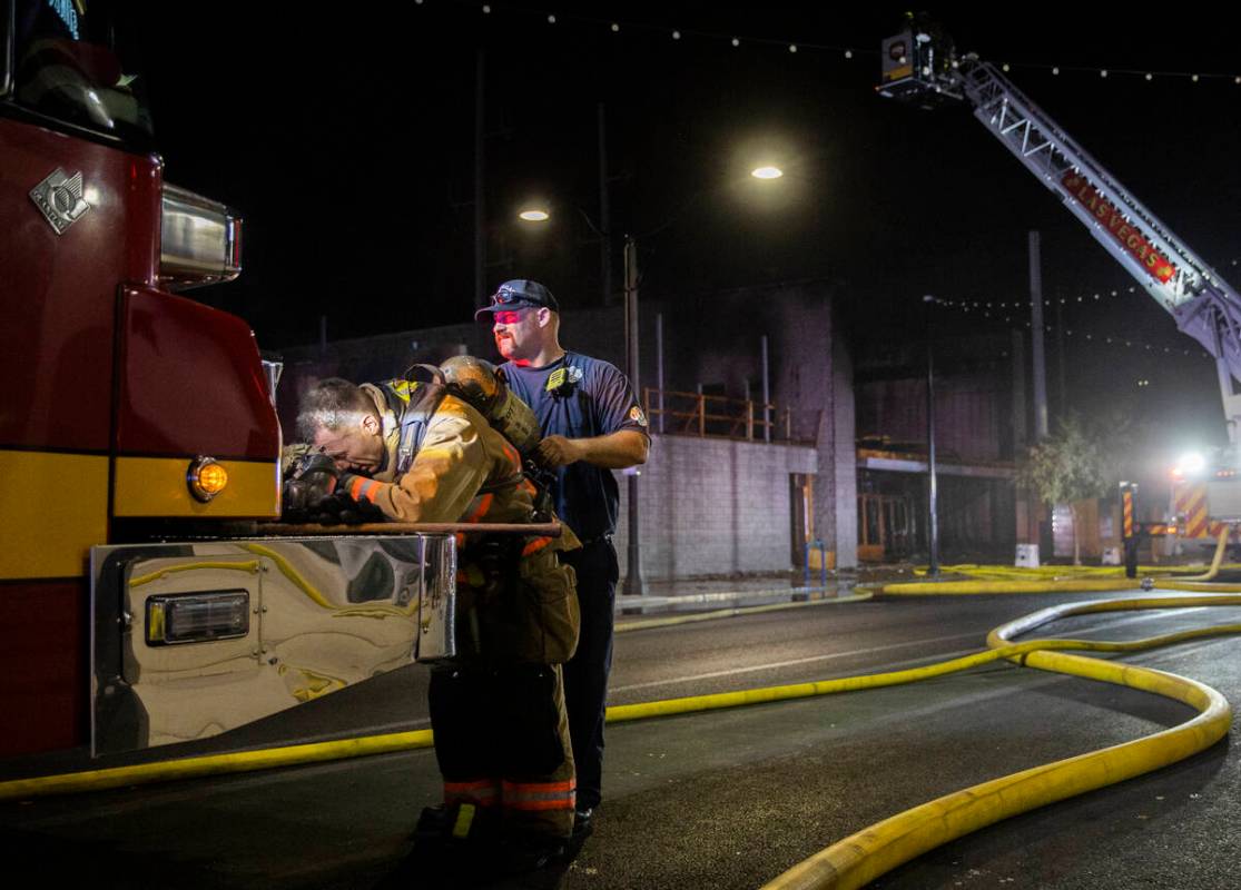 The Las Vegas Fire Department responds to the aftermath of a fire at 1026 S. Main Street on Sun ...