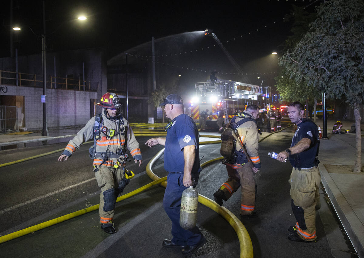 The Las Vegas Fire Department responds to the aftermath of a fire at 1026 S. Main Street on Sun ...