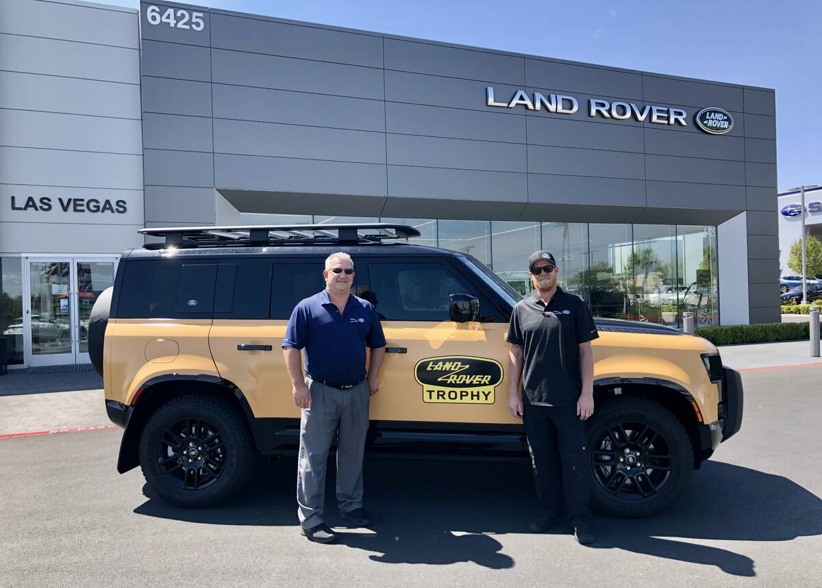 Jaguar Land Rover Las Vegas sales manager Kevin Kesick, left, and shop foreman Rick Marshall ar ...