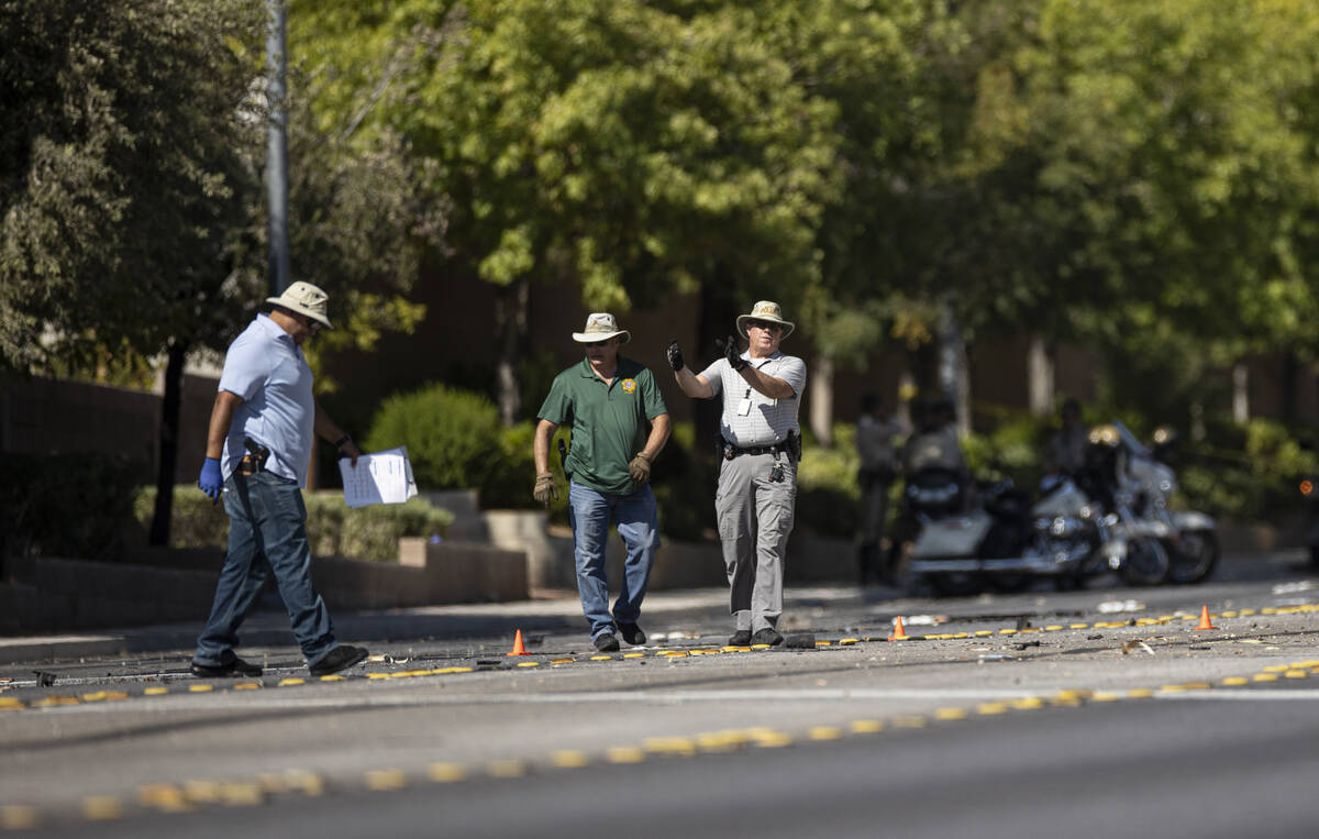 Law enforcement investigates a fatal car crash near North Tenaya Way and Farm Road on Monday, S ...