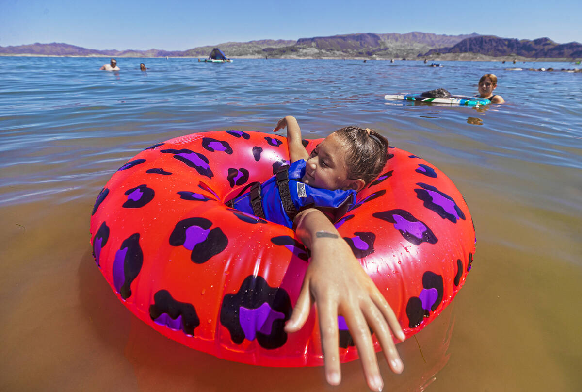 Leila Tillman, 6, floats in Lake Mead on Labor Day on Monday, Sept. 6, 2021, in Boulder City. ( ...