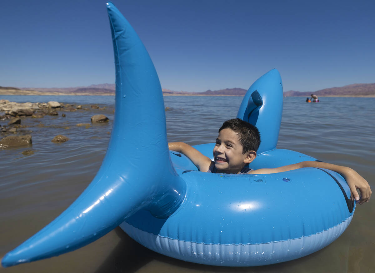Mason Soto, 6, enjoys playing in Lake Mead on Labor Day on Monday, Sept. 6, 2021, in Boulder Ci ...