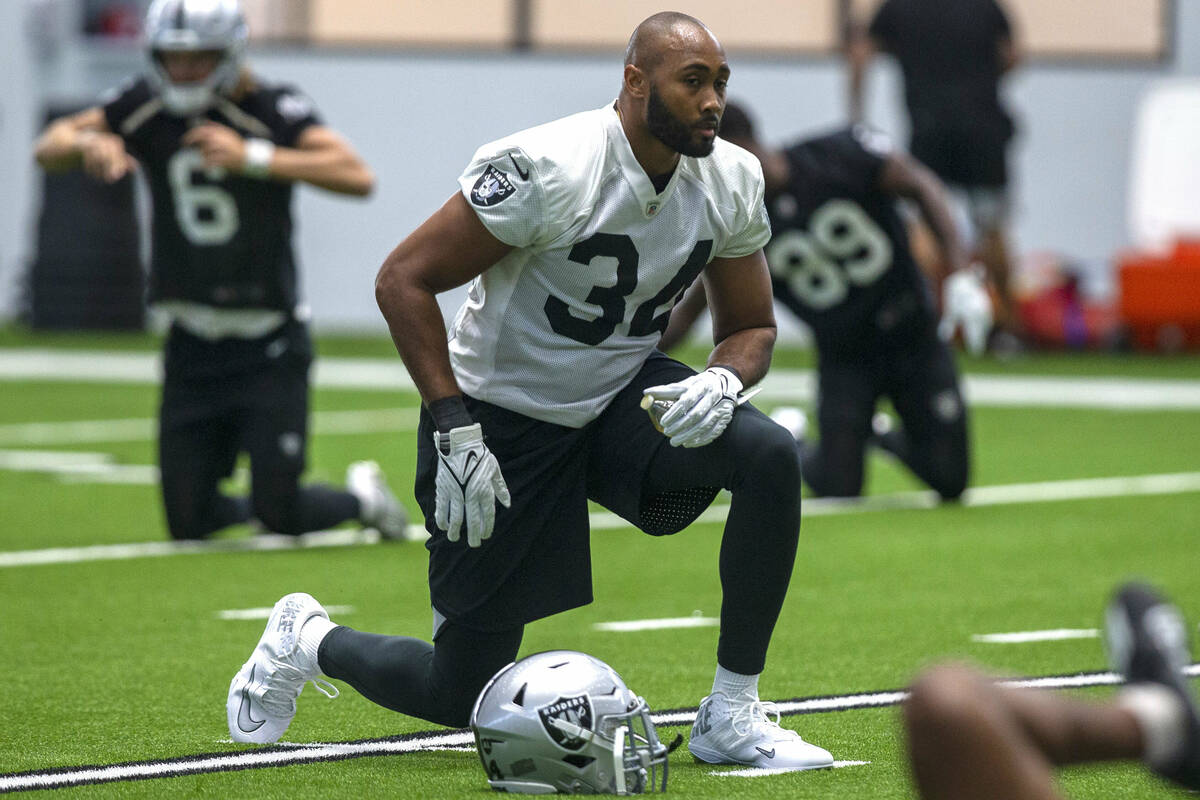 Raiders linebacker KJ Wright (34) stretches during team practice at the Raiders Headquarters at ...