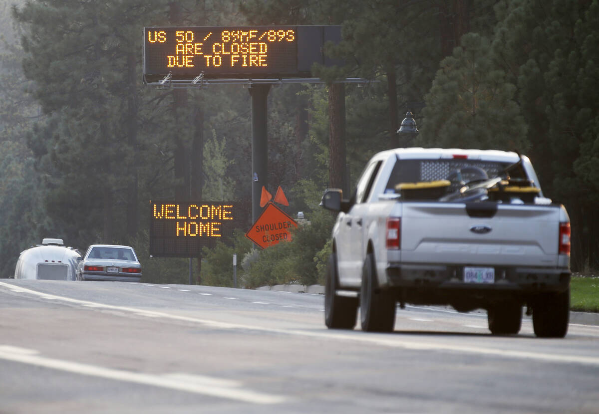 Traffic flows along Highway 50 in South Lake Tahoe, Calif., Sunday, Sept. 5, 2021. Cal Fire off ...