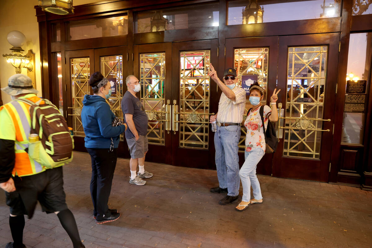 Lori Doane, from left, John Carollo, Ronald Rasmusson and Yong Cho, all of Las Vegas, wait outs ...