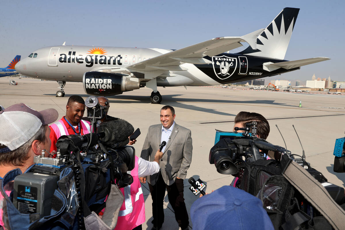 Raiders President Dan Ventrelle talks about Allegiant Air's Raiders-themed aircraft at McCarran ...