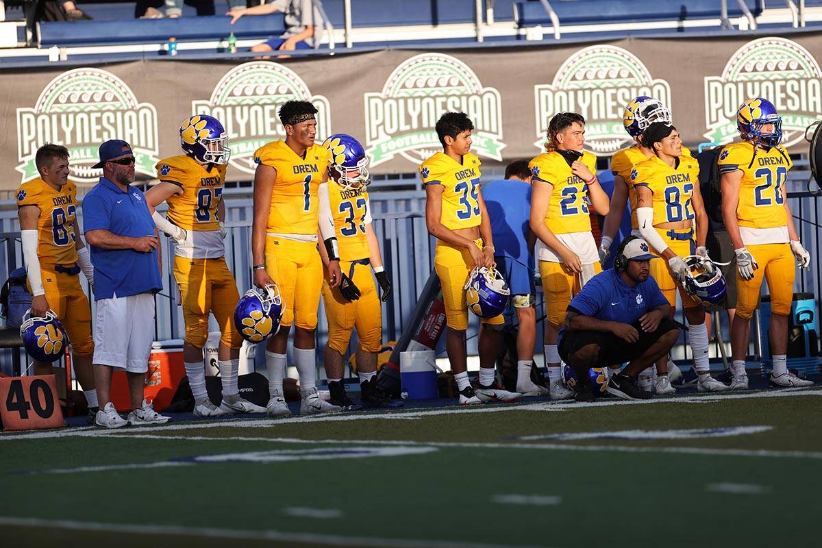 Orem's bench watches the game in the third quarter of a football game against Desert Pines at B ...