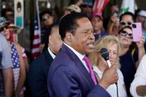In this July 13, 2021, file photo, conservative radio talk show host Larry Elder speaks to supp ...