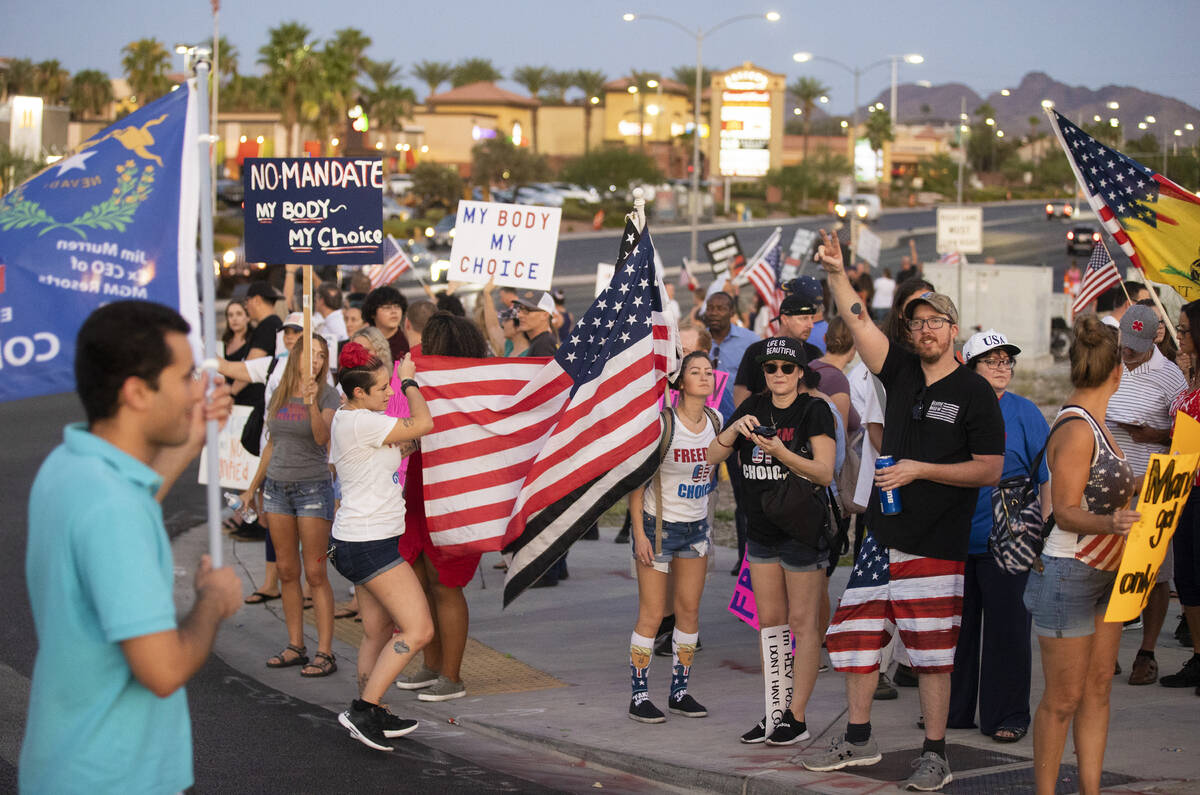 Hundreds of demonstrators with causes ranging from vaccination and mask mandates, to political ...