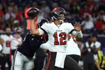 Tampa Bay Buccaneers quarterback Tom Brady (12) throws a pass against the Houston Texans during ...