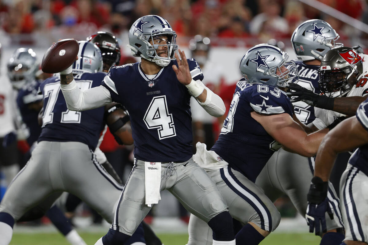Dallas Cowboys quarterback Dak Prescott (4) throws a pass against the Tampa Bay Buccaneers duri ...