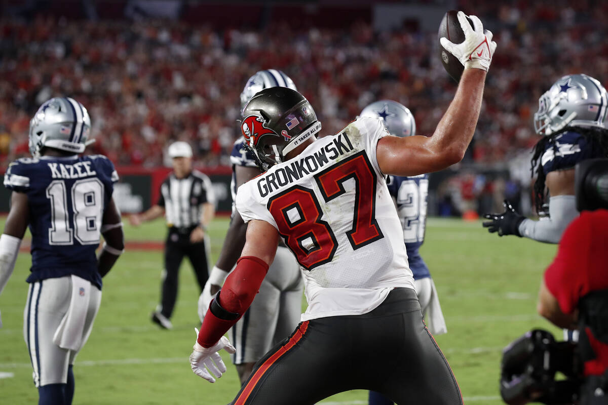 Tampa Bay Buccaneers tight end Rob Gronkowski (87) spikes the football after his 2-yard touchdo ...
