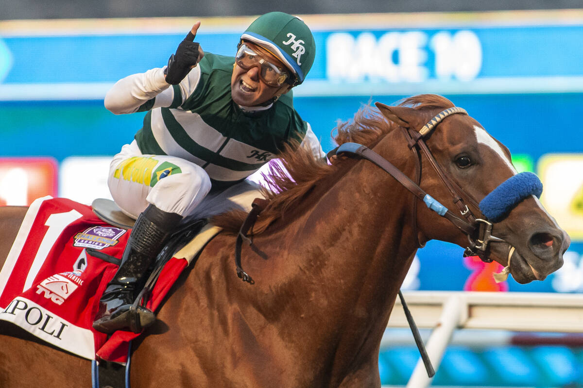 In a photo provided by Benoit Photo, Tripoli and jockey Tiago Pereira win the $1 million TVG Pa ...