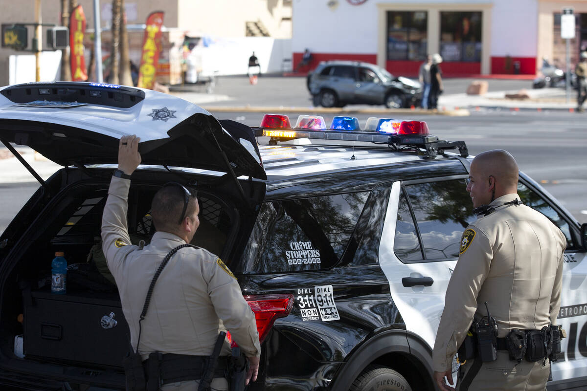 Las Vegas police respond to the scene of a fatal car accident at the intersection of West Flami ...